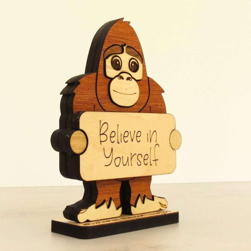 Angled view of layered hardwood emotional support bigfoot showing wood species detail and construction