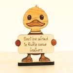 Handcrafted hardwood emotional support duck desk pet holding sign that reads Don't Be Afraid to Ruffle Some Feathers