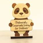 Handcrafted hardwood emotional support panda desk pet holding sign that reads Strategically Conserving Energy for Greatness