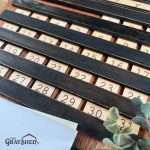 Vintage style perpetual calendar, close up view of the slide-in days of the month in their tracks.
