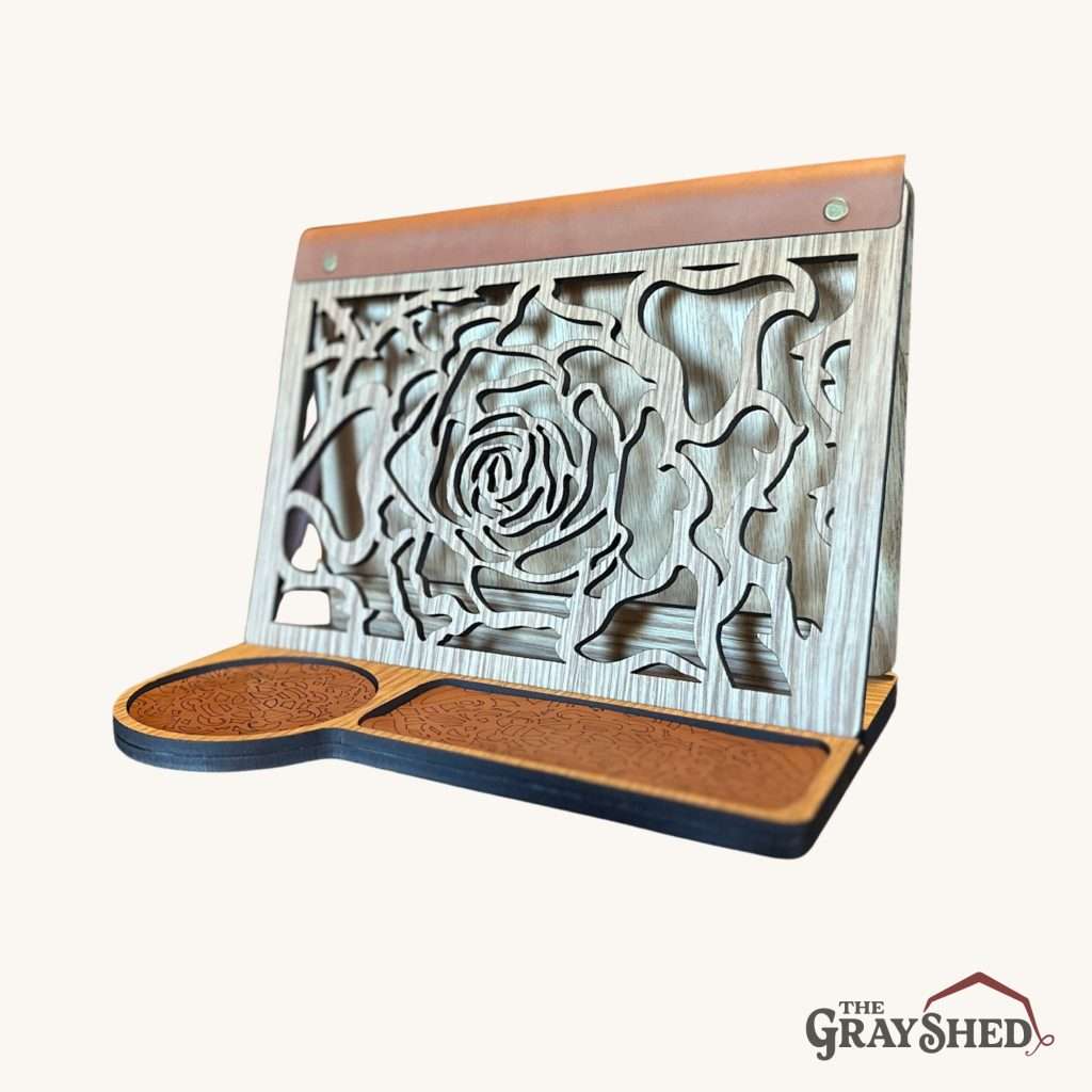 Rose design front book stand shown in Oak wood with light leather accents.